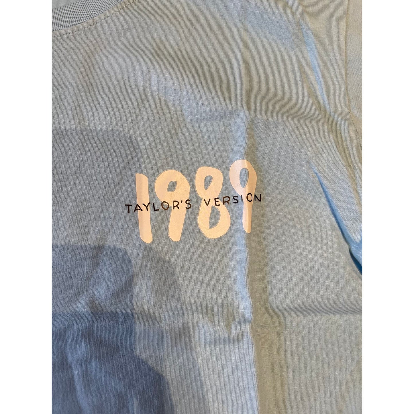 NWOT Taylor Swift 1989 Taylor's Version Light Blue Logo Women's Medium T-Shirt